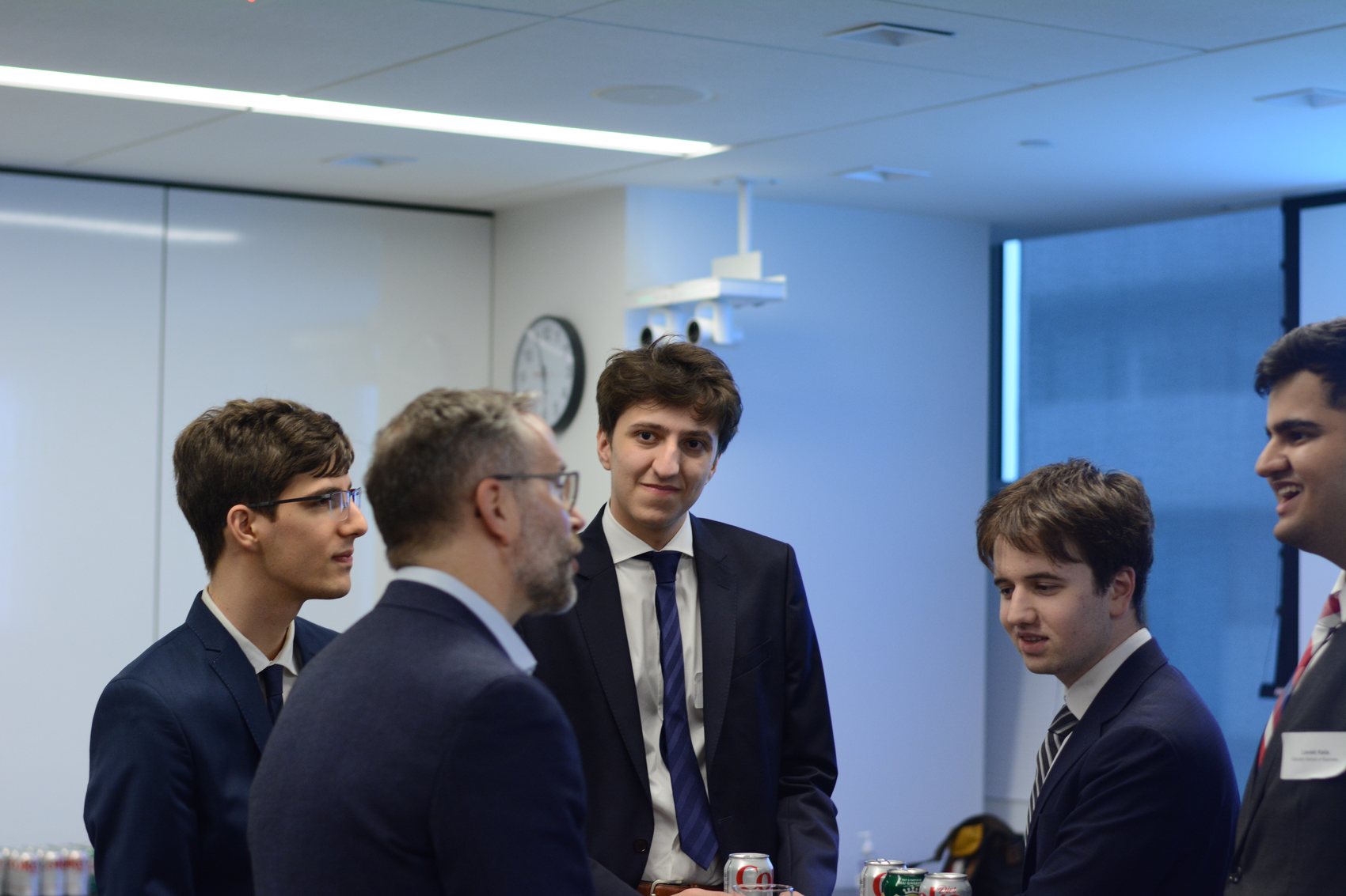 A guest speaker presenting to YUSIF analysts in a speaker session